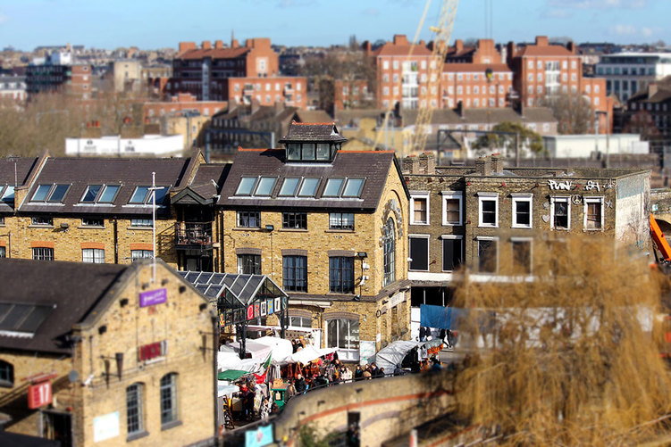 A tilt-shift image of the Camden Lock Market and the old facade of the Camden Lock Village - Camden Market, Camden Town, London - Tily Travels.
