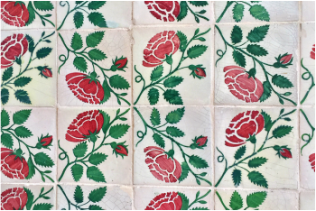 Close up of pink and green floral Azulejos - Alfama district, Lisbon - Portugal.