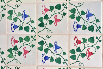 Close up of pink, blue and green floral Azulejos - Alfama district, Lisbon - Portugal.