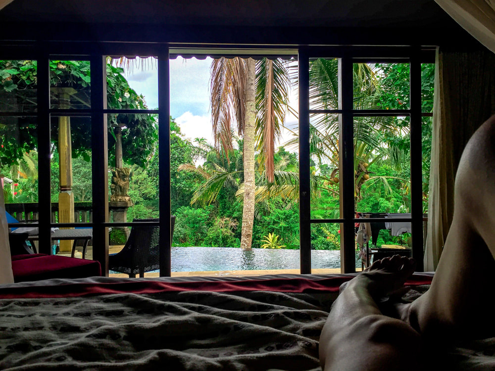 The view from bed, inside the Govardana Villa. Dwaraka, the Royal Villas, Ubud, Bali, Indonesia.