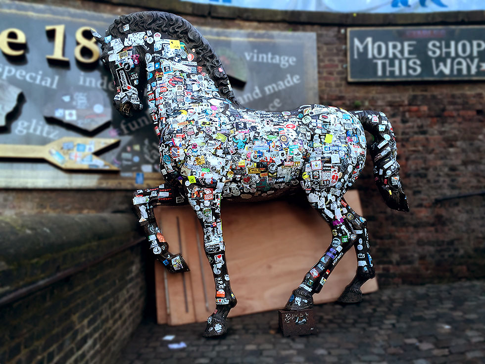One of the many bronze horse sculptures scattered around the Stables Market - Camden Market, Camden Town, London - Tily Travels.