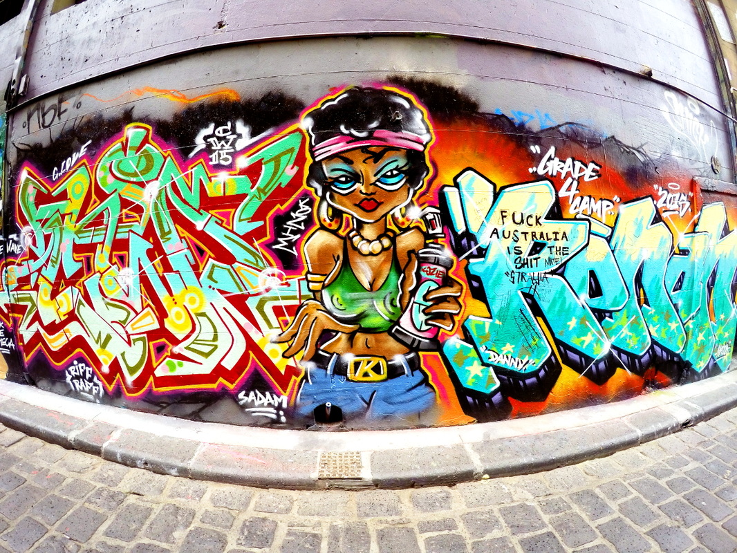 Hosier Lane Street Art, Melbourne, Australia, September 2015 - Work (left, center) by Kozie.