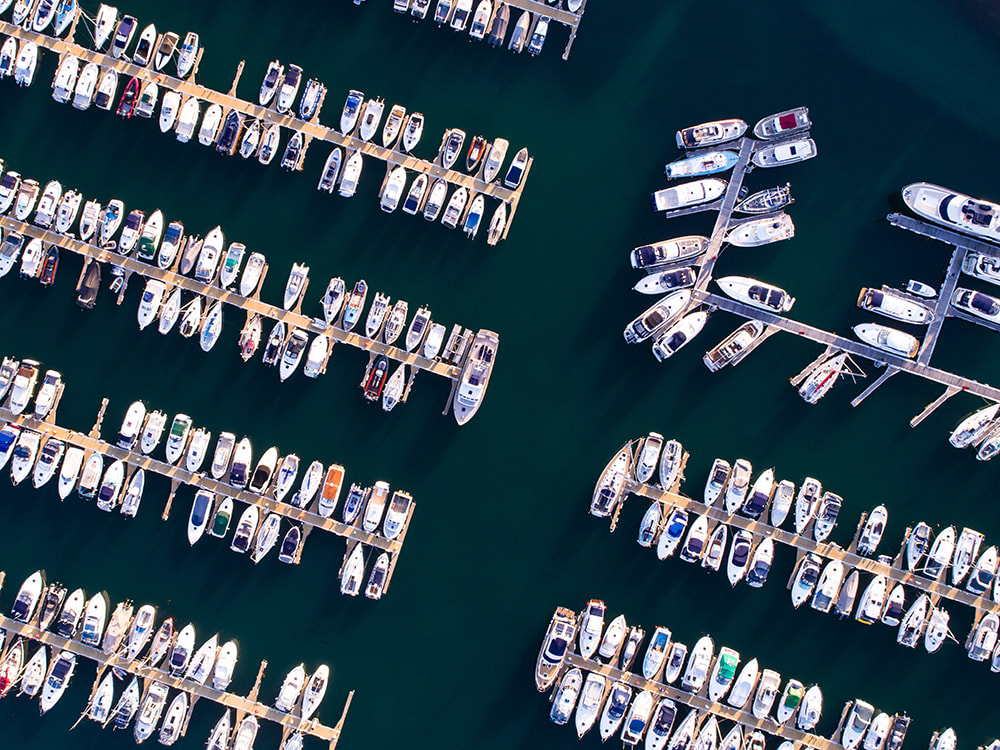 Using Transport To Transform Your Trips. Boats docked at the Harbour.