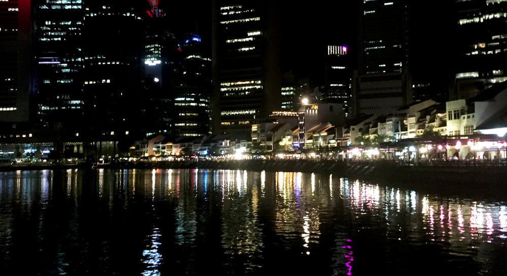 The lights of Boat Quay, Singapore at night.