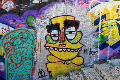 Character by Milton - Street art and graffiti on the Calcada do Lavra stairway, Lisbon, Portugal - Calçada do Lavra street art.