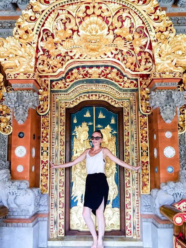  The intricate gold detail at the entrance to the Royal Villa. Dwaraka, the Royal Villas, Ubud, Bali, Indonesia.