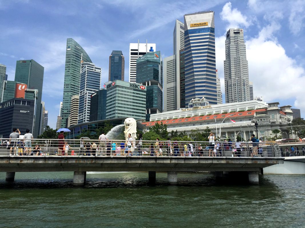 Cruising along the Singapore River, past the Merlion at Merlion Park, Singapore.