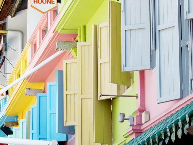 A close up of the colourful window shutters adorning businesses in Clarke Quay, Singapore.