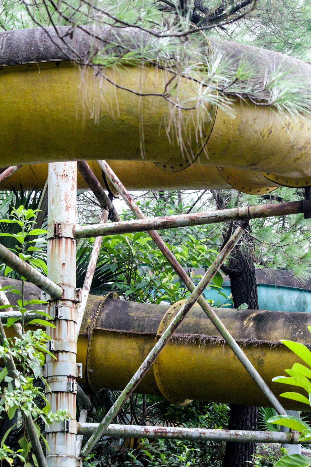 Detail of the large yellow water slide // Hue: Ho Thuy Tien, Photos of Vietnam's Abandoned Water Park.