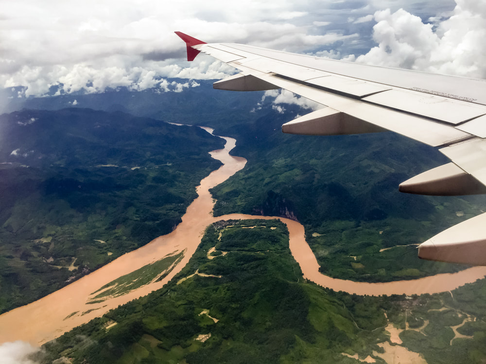 Flying over the jungle and Mekong River on arrival into Luang Prabang, Laos. AirAsia Flight 617.