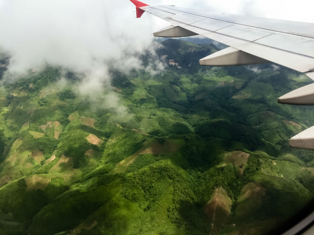 Rolling hills and dense jungle. AirAsia 617. Laos.