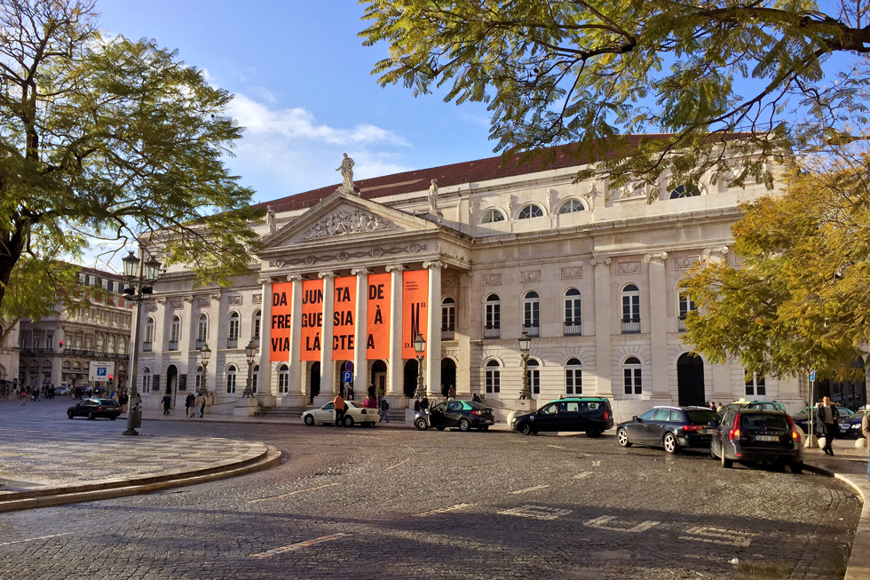 Sun shining on the National Theatre D.Maria II (Teatro Nacional D.Maria II) in Pedro IV/ Rossio Square, Lisbon, Portugal.