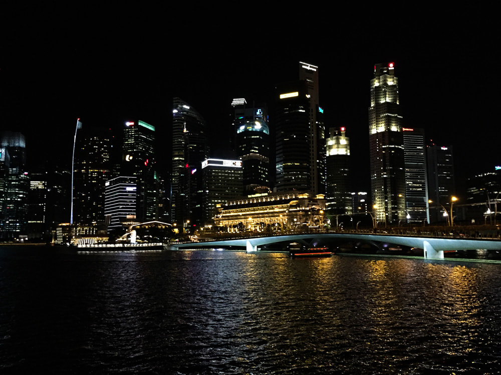 Singapore City skyline lights. Cityscape at night. Misadventure in Singapore City