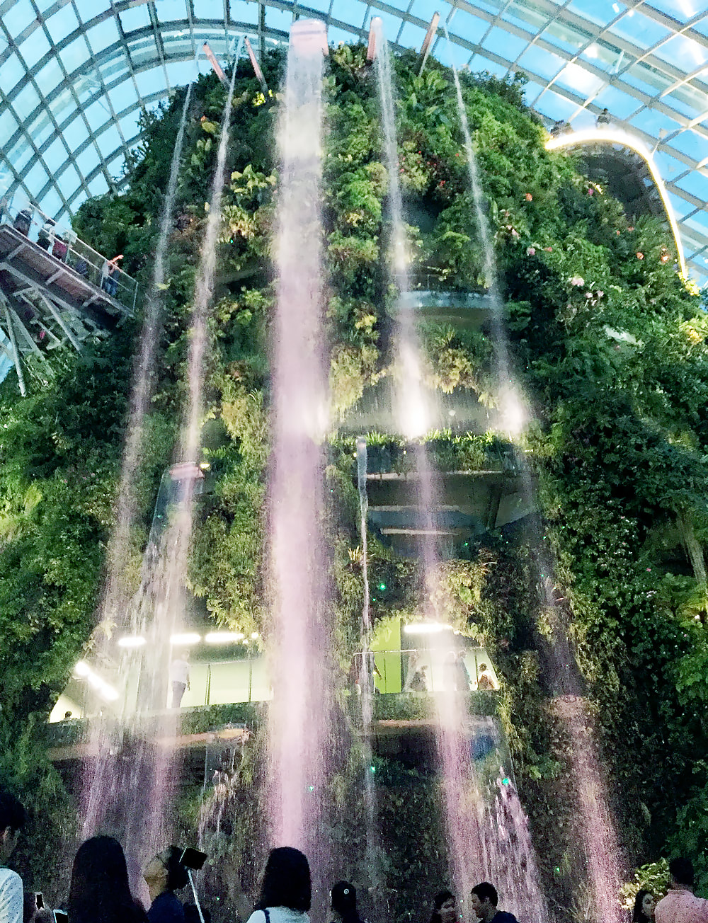 The 35-metre tall waterfall inside of the Cloud Forest at Gardens by the Bay, Singapore.
