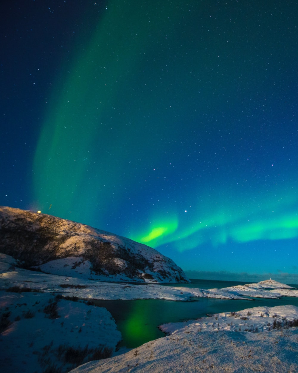  What To Wear (& Pack) On Your Winter Break: The Ultimate Guide - Aurora Borealis at Tromso, Norway