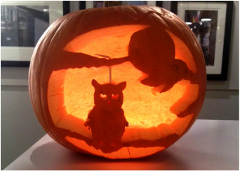 Halloween in London - Jack o'lantern, owl sitting in a tree carved.