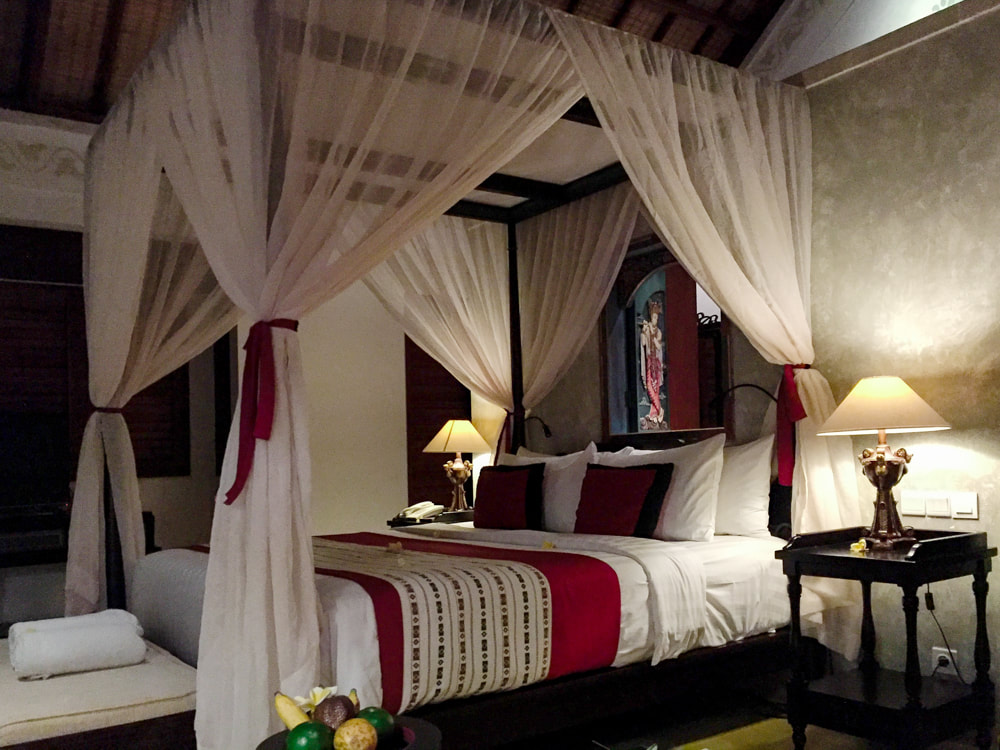 The 4 poster bed inside the Govardana Villa. Dwaraka, the Royal Villas, Ubud, Bali, Indonesia.