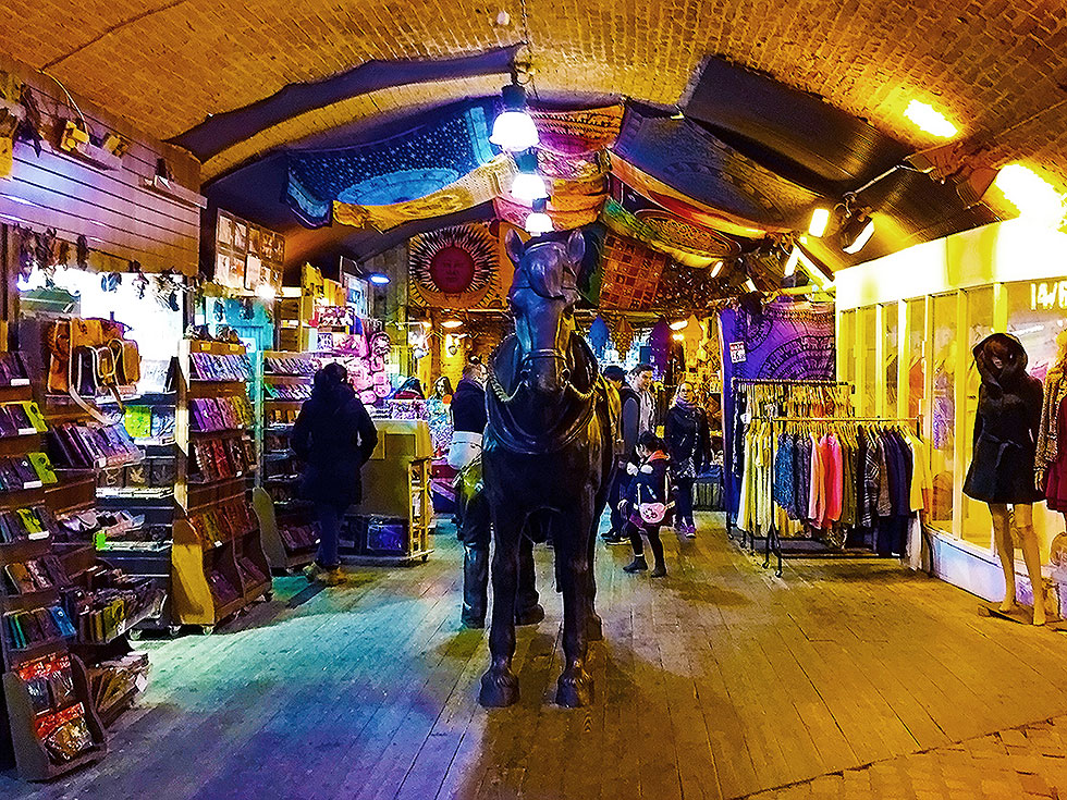 Inside the Horse Tunnel Market/ Stables Market section of the Camden Market - Camden Town, London England - Tily Travels.