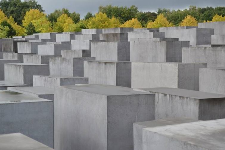 Holocaust Memorial, Berlin, Germany - Concrete columns with the trees behind. - Tily Travels