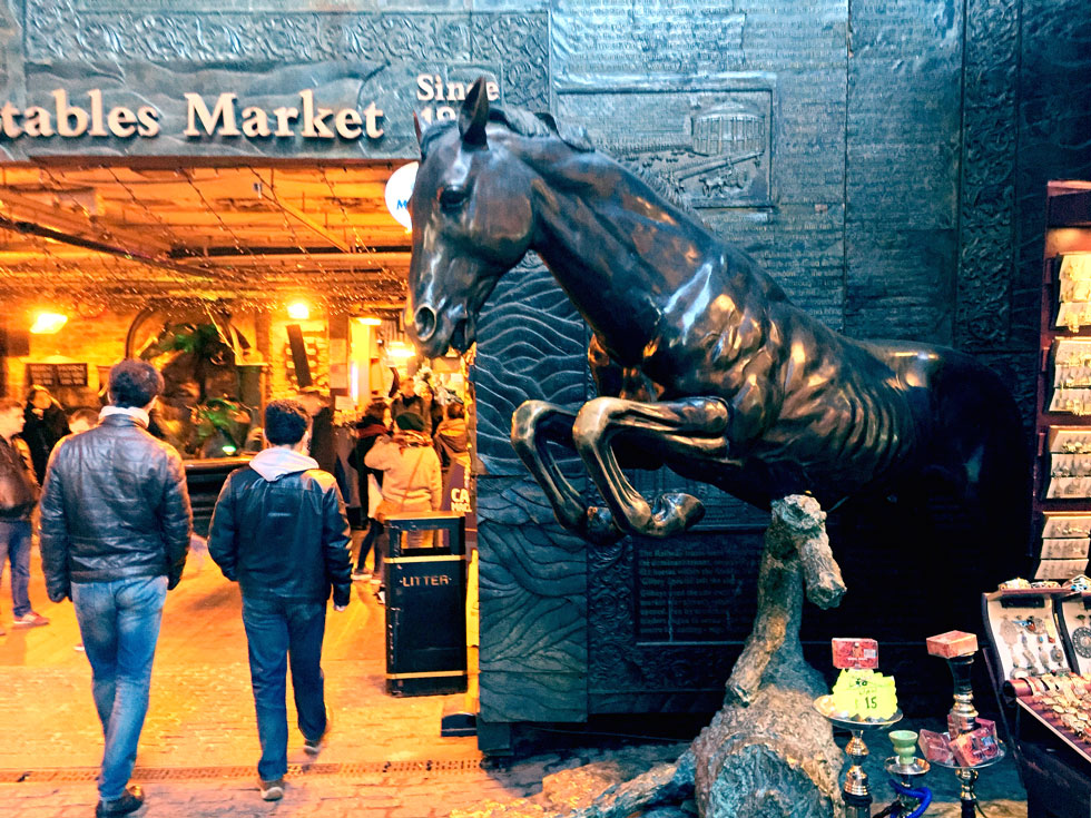 Bronze horse sculpture at the entrance to the Stables Market/ Horse Tunnel Market - Camden Market, Camden Town, London - Tily Travels.
