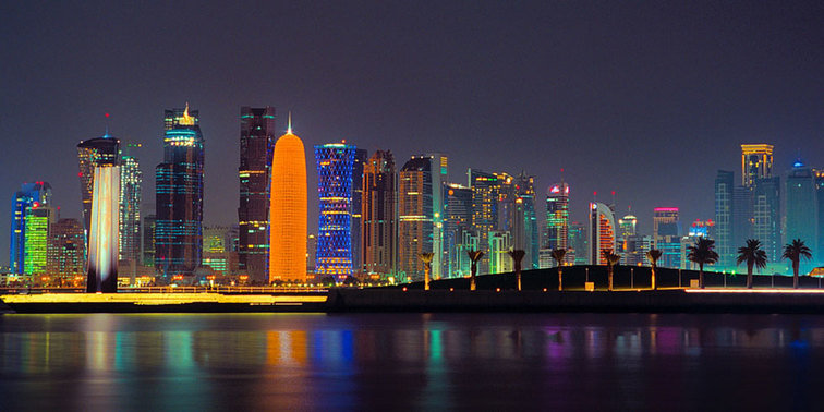  International Airport's with Free Layover Transit Tours - Hamad International Airport, Doha, Qatar - Doha Skyline at night.