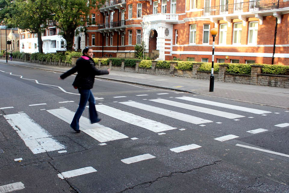 Elise crossing Abbey Road - Abbey Road Crossing, London, England - Tily Travels.