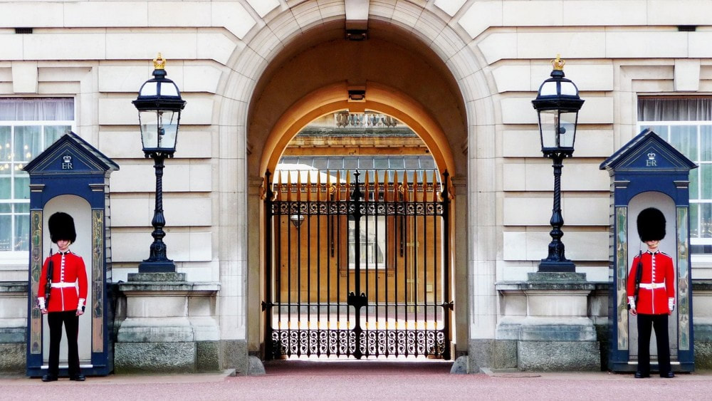 Tips for Traveling when you Visit London for the First Time - Guards at Buckingham Palace.
