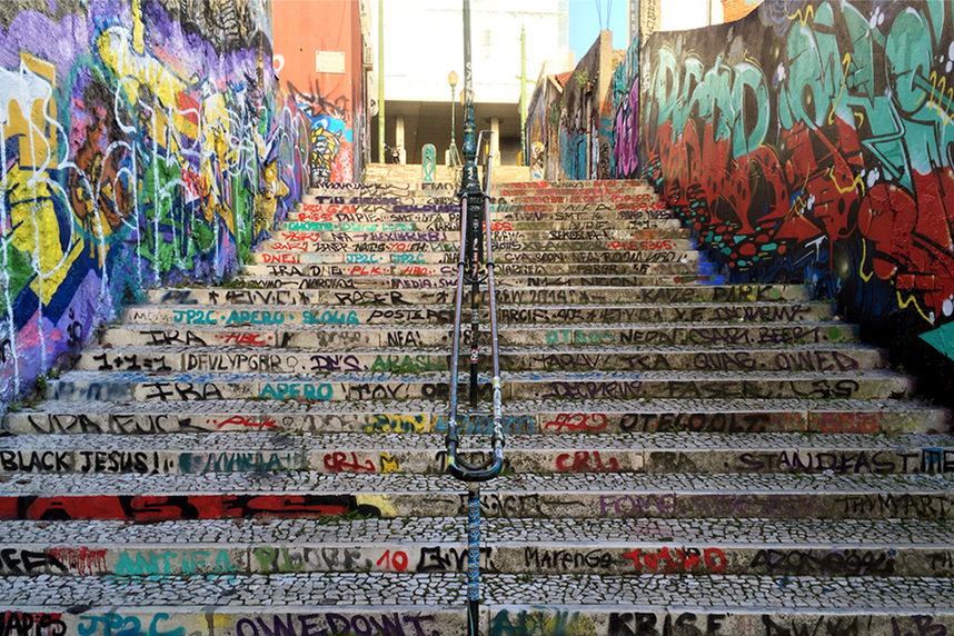 Graffiti covered stairs and alley Calcada do Lavra, Lisbon, Portugal - Calçada do Lavra street art.