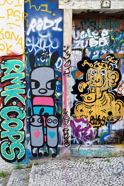 Street art and graffiti on the Calcada do Lavra stairs, Lisbon, Portugal - Calçada do Lavra street art.