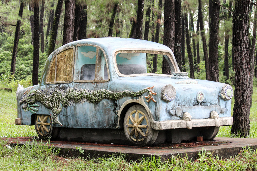 Quirky car statue // Hue: Ho Thuy Tien, Photos of Vietnam's Abandoned Water Park.