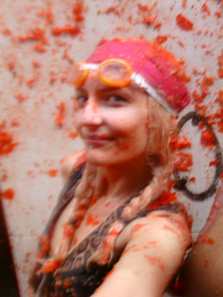 Covered in tomatoes after the completion horn sounds at La Tomatina 2013
