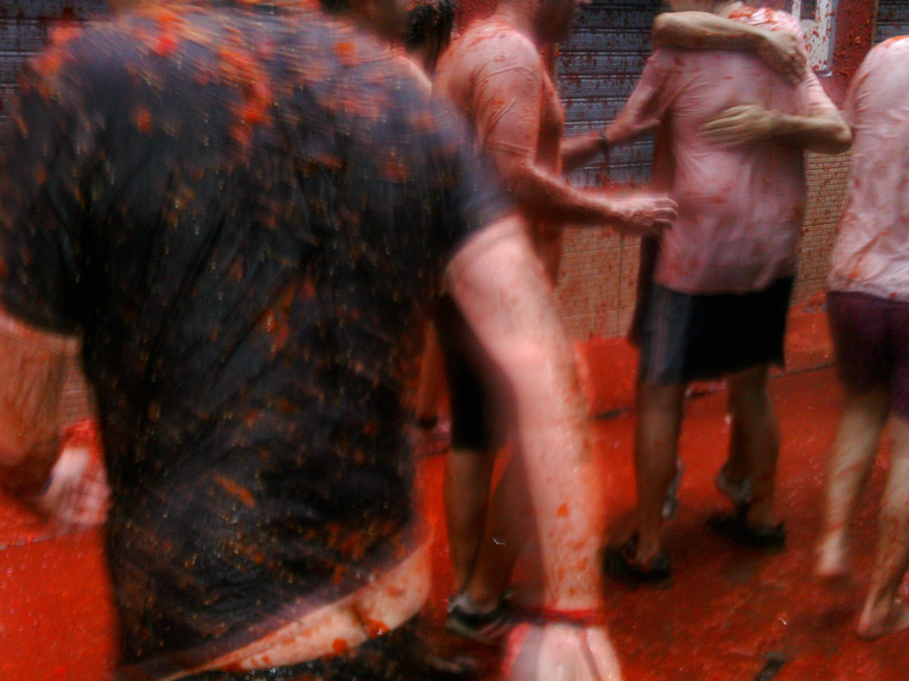 Covered in tomatoes at La Tomatina 2013