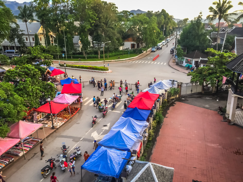 View of the night market entrance from the rooftop bar at Indigo. Luang Prabang, Laos.