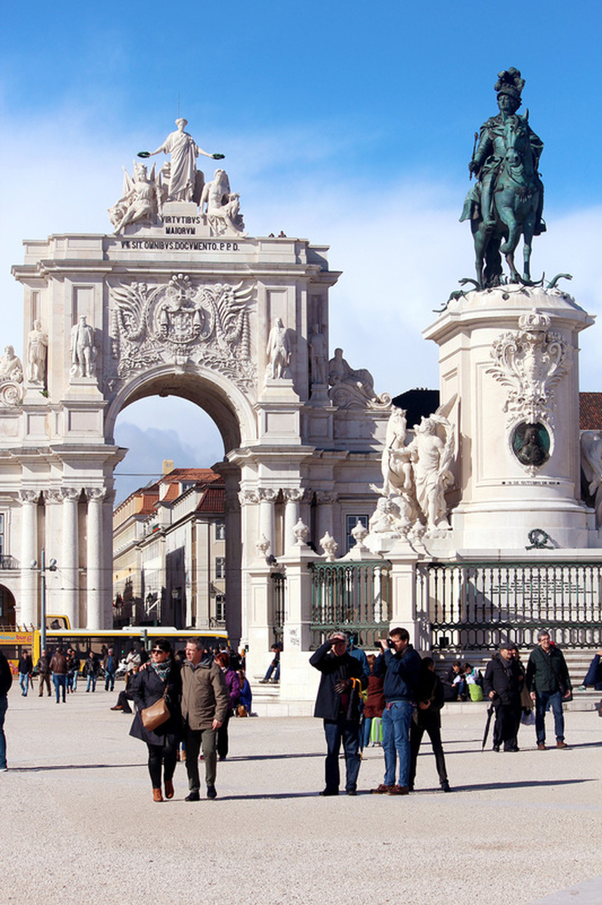 The Rua Augusta Arch and the statue of King José I, Praca do Comercio, Lisbon, Portugal.