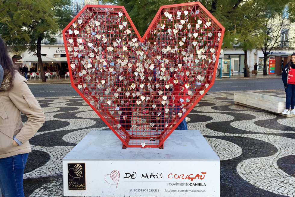 Valentines Day love locks, heart exhibit in Pedro IV/ Rossio Square, Lisbon, Portugal.